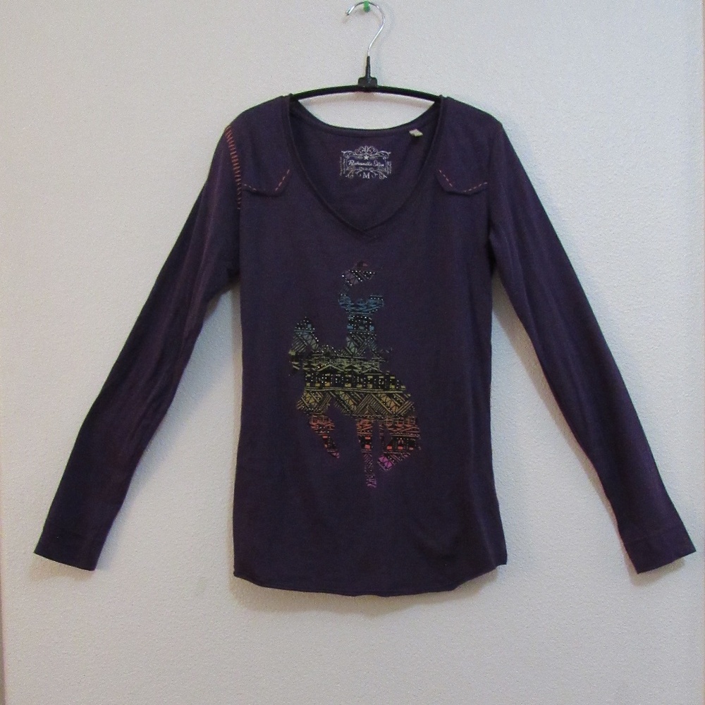 Purple long sleeved tee with cowboy design and decorative stitching
